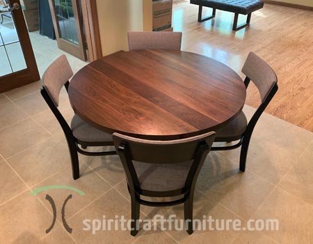 Round solid wood dining tables made in the USA from kiln dried hardwood to endure generations from our Dundee, Illinois location